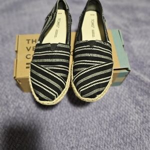 TOMS Black and White Patterned Slip-Ons